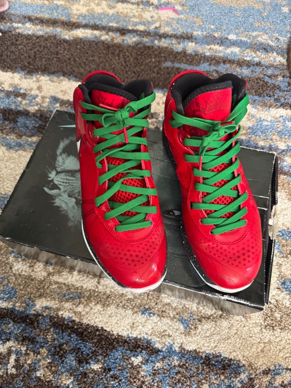 Nike Red High-Top Sneakers with White Swoosh and Green Laces